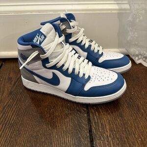 Blue and grey air Jordan 1’s.